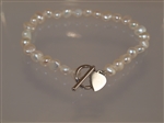 Srebrna bransoletka z perłami